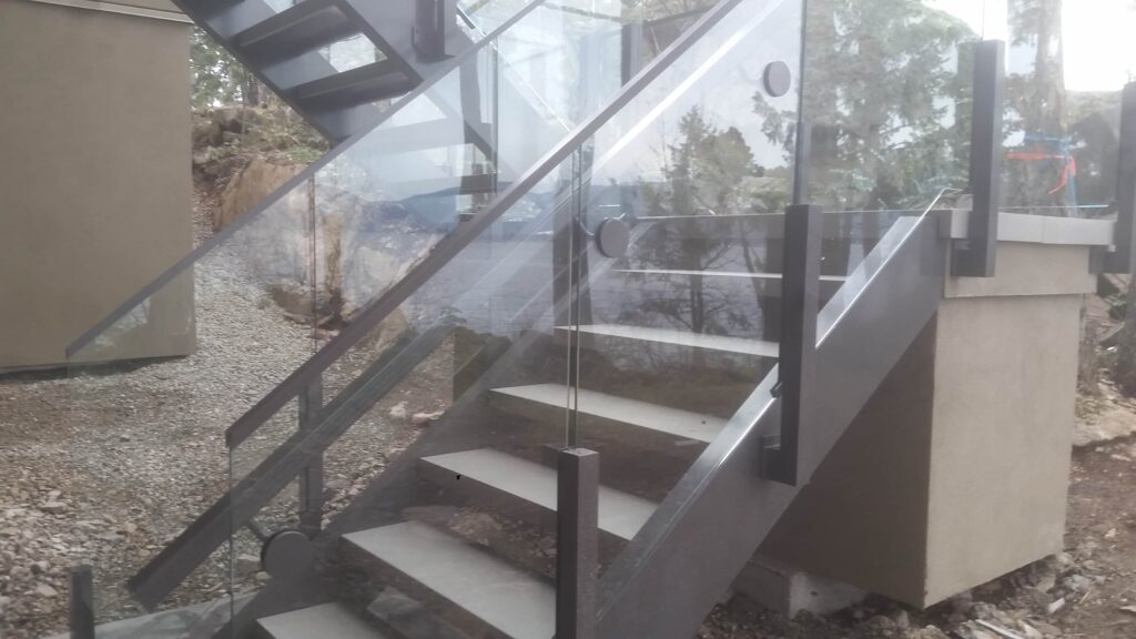 10mil Infinity Glass Custom Railing on Outdoor Residential Deck