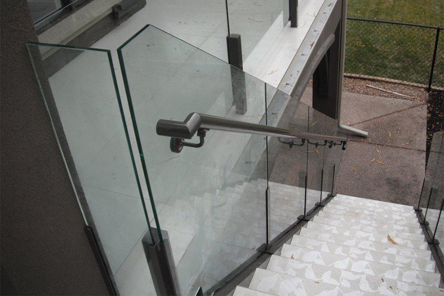 10mil Infinity Glass Custom Railing on Outdoor Residential Deck